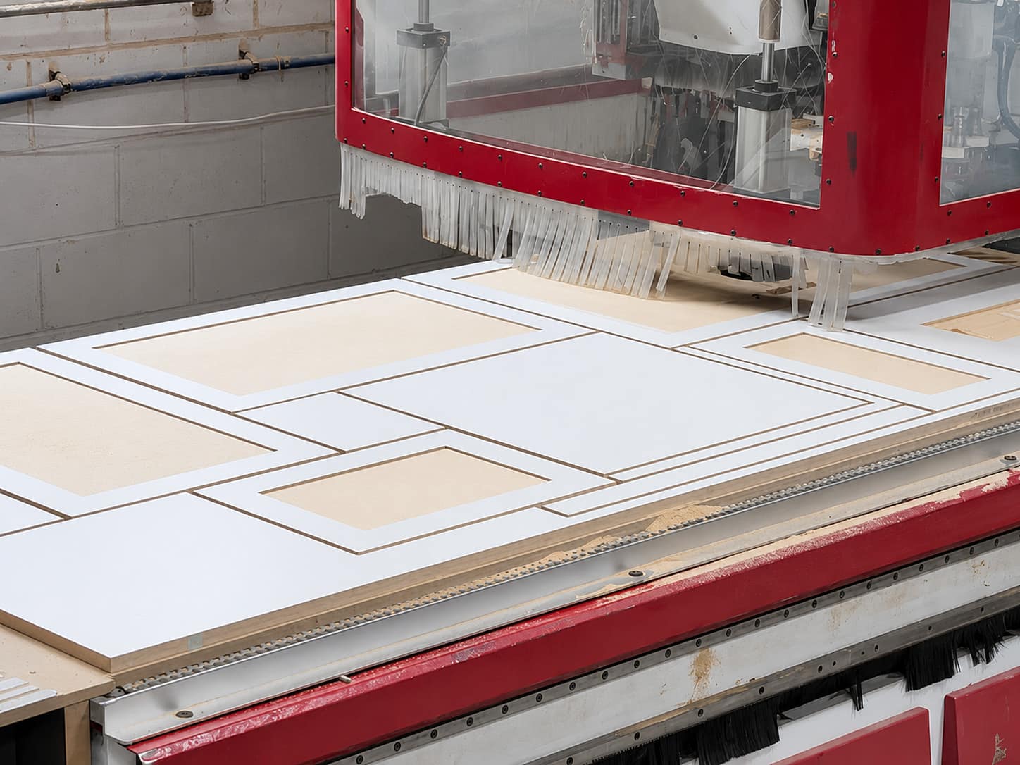 CNC machine cutting vanity panels in the Vanify workshop